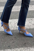 CROSS-STRAP PUMPS
